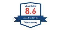 Avvo Rating 8.6, Top Attorney Alan Brandon Tse, blue and red shield-shaped emblem.