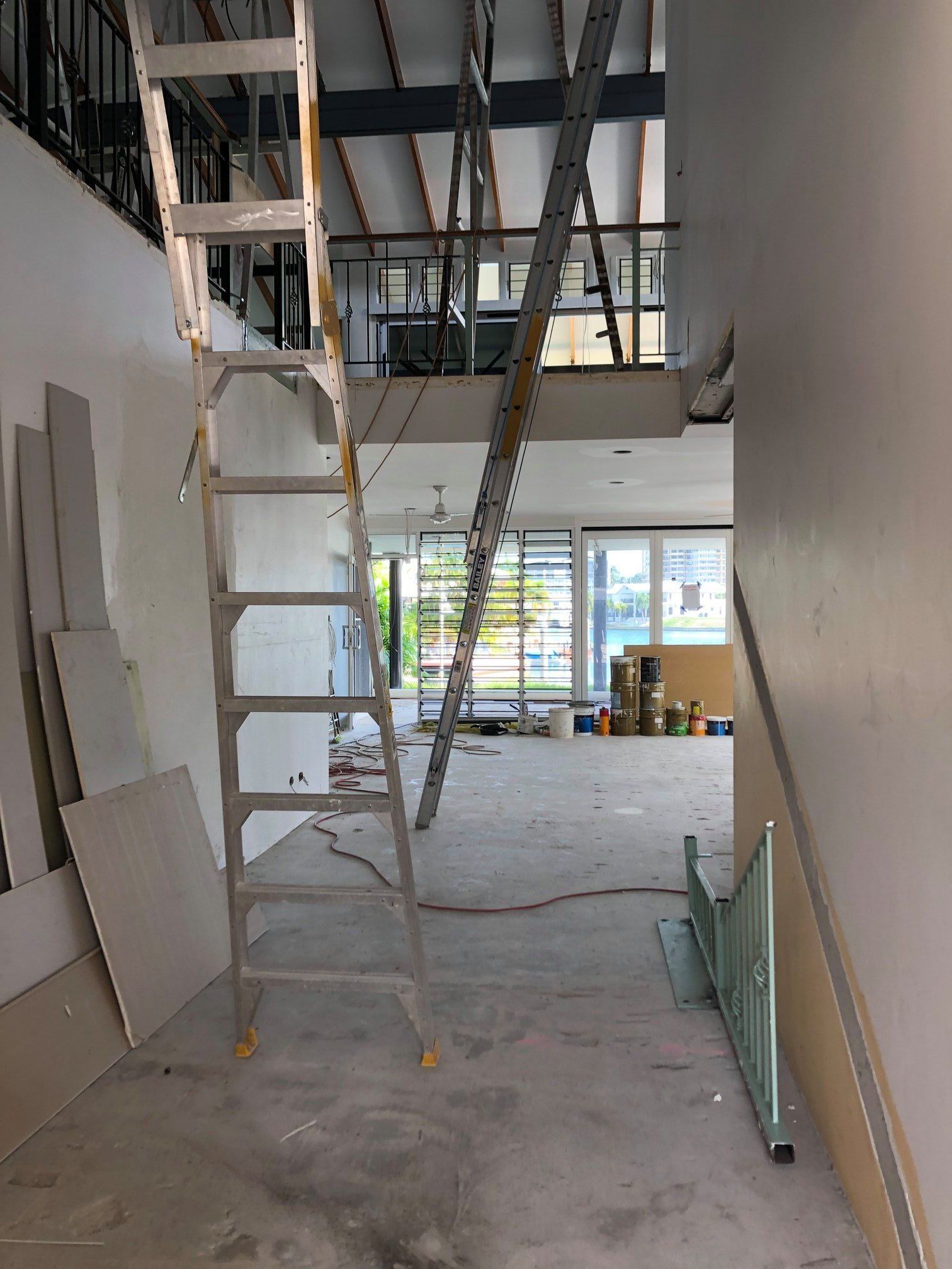 An Interior Construction Scene with A Ladder — Invision NT in Coconut Grove, NT