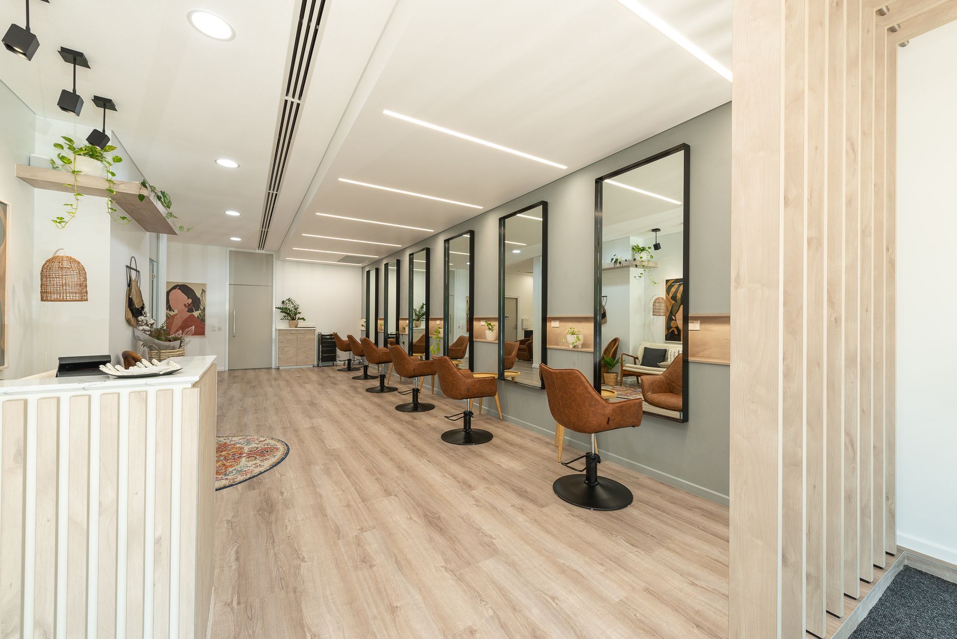 A Hair Salon Interior with Styling Stations — Invision NT in Coconut Grove, NT