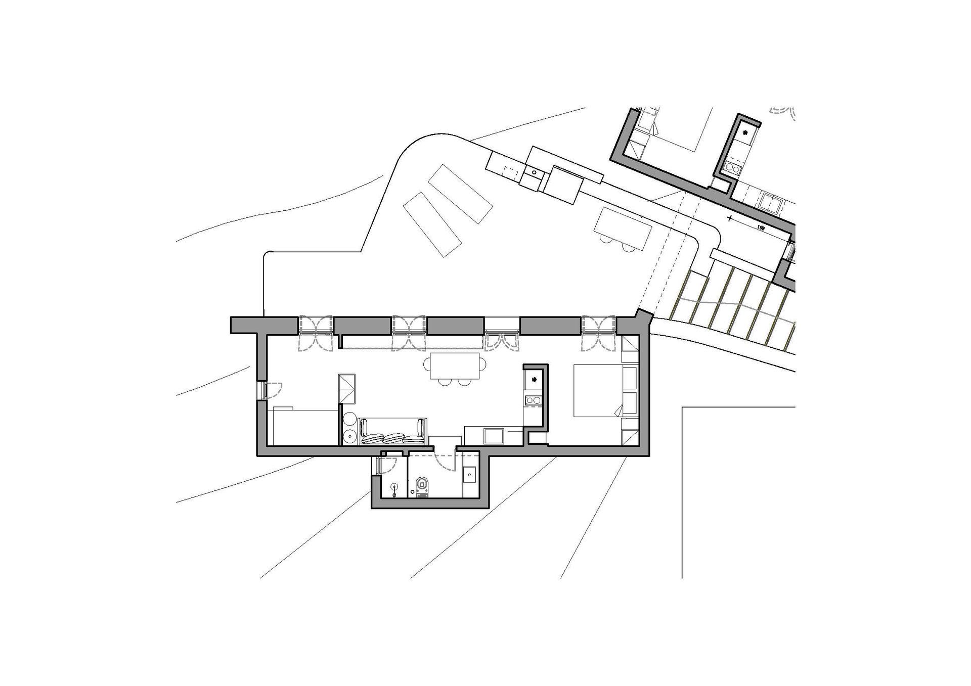 A black and white floor plan of a house on a hill.