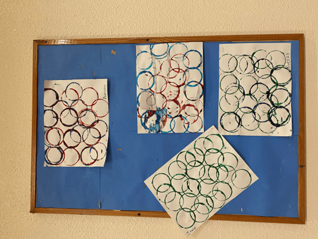A blue board with circles painted on it