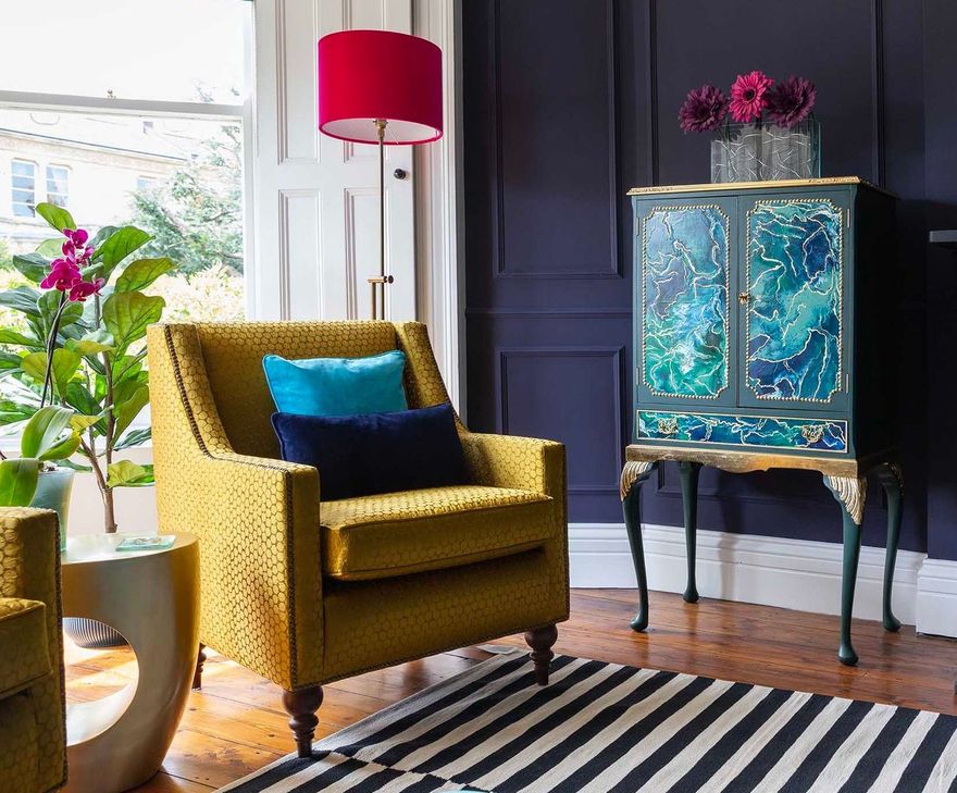 Fine furniture and upholstery from Kay’s bespoke furnishings. Bespoke yellow armchair plus stunning upcycled wooden drinks cabinet. K Interiors.