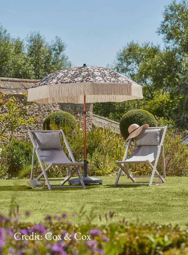 Cox & Cox parasol set up in sunny garden