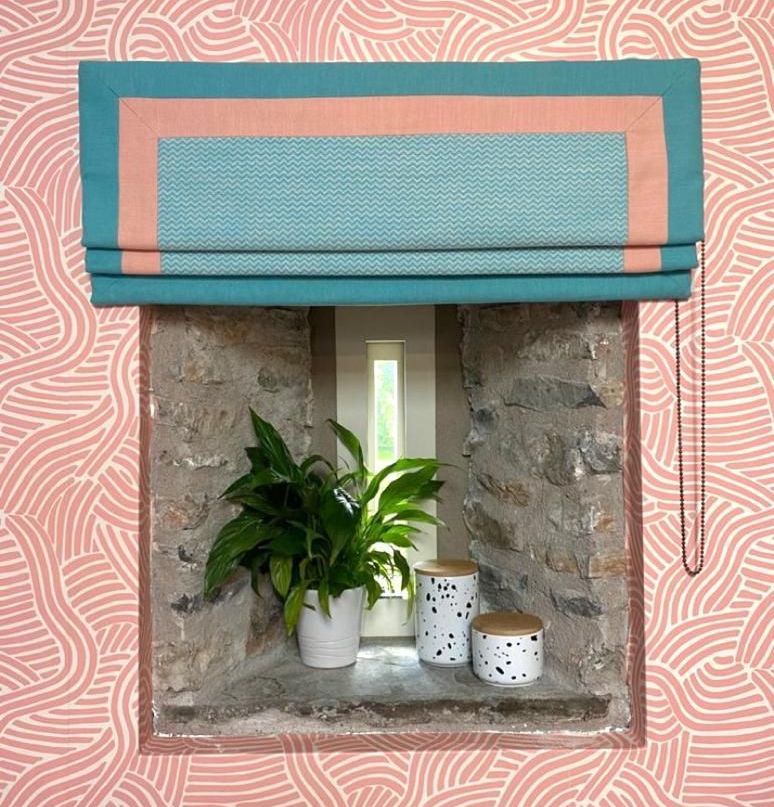 Peach and teal window blinds. An example of K Interiors’ bespoke interior design services.