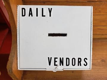 White sign reading 