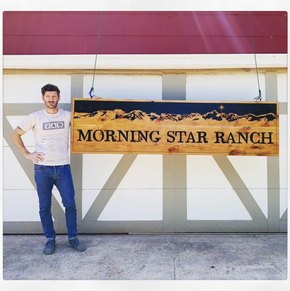 Matt Street with Fat Bison wood sign 