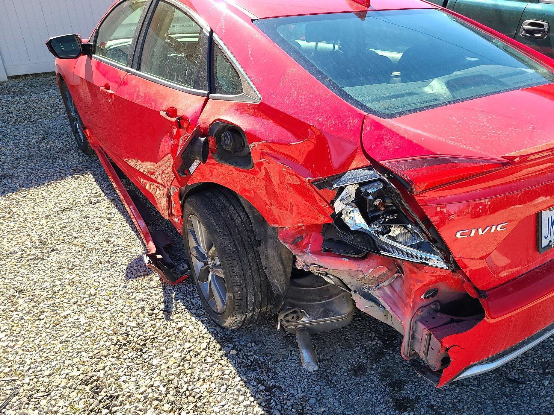 Before Front Damaged Blue Car — Dover, OH — Cua Refinishing Co.