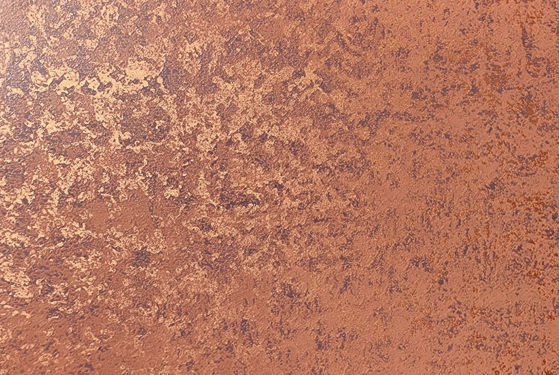 Textured orange-brown surface with gold-colored patches, resembling aged metal or weathered stone.