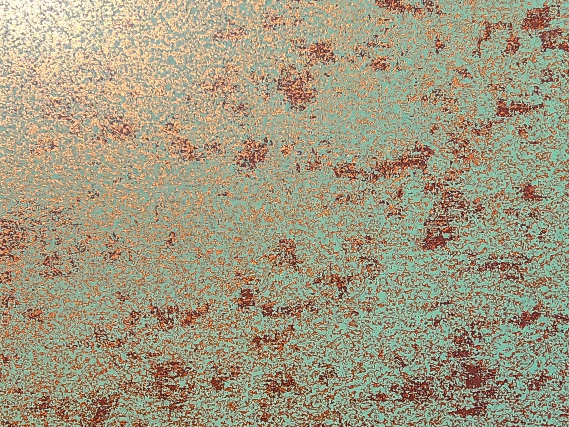 Textured surface: copper-toned with teal patina.