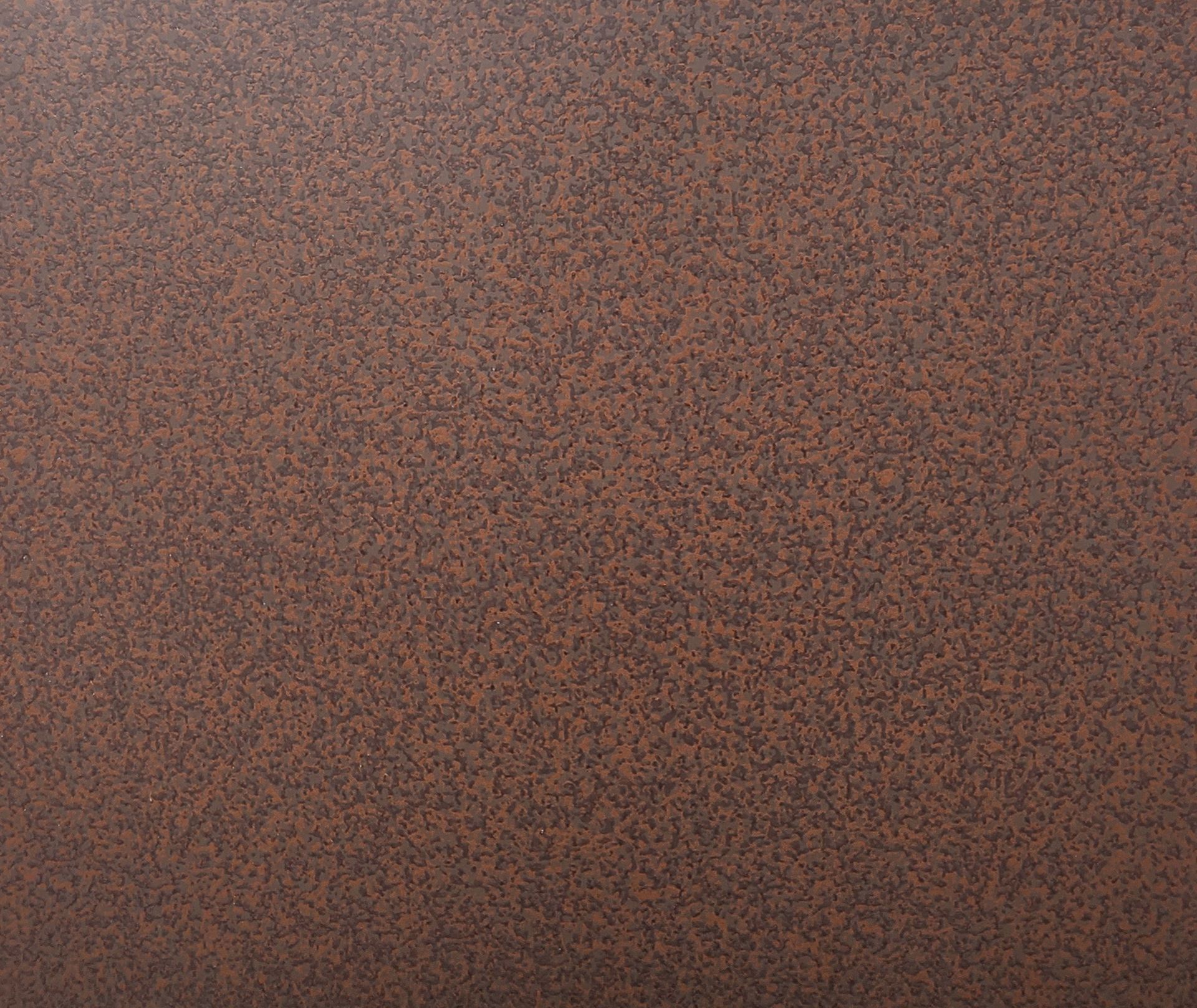 Brown textured surface with small, speckled details.