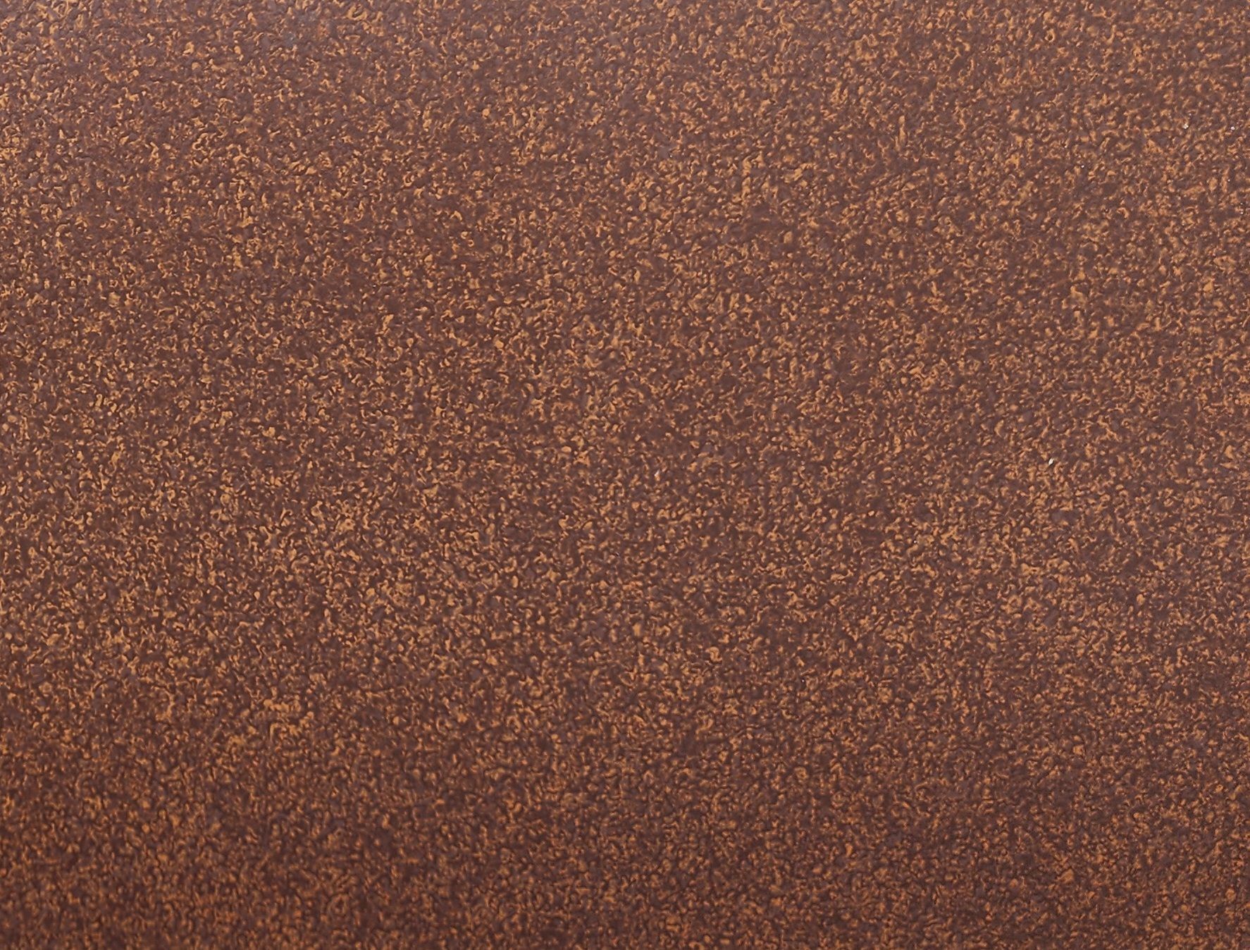 Brown speckled background.