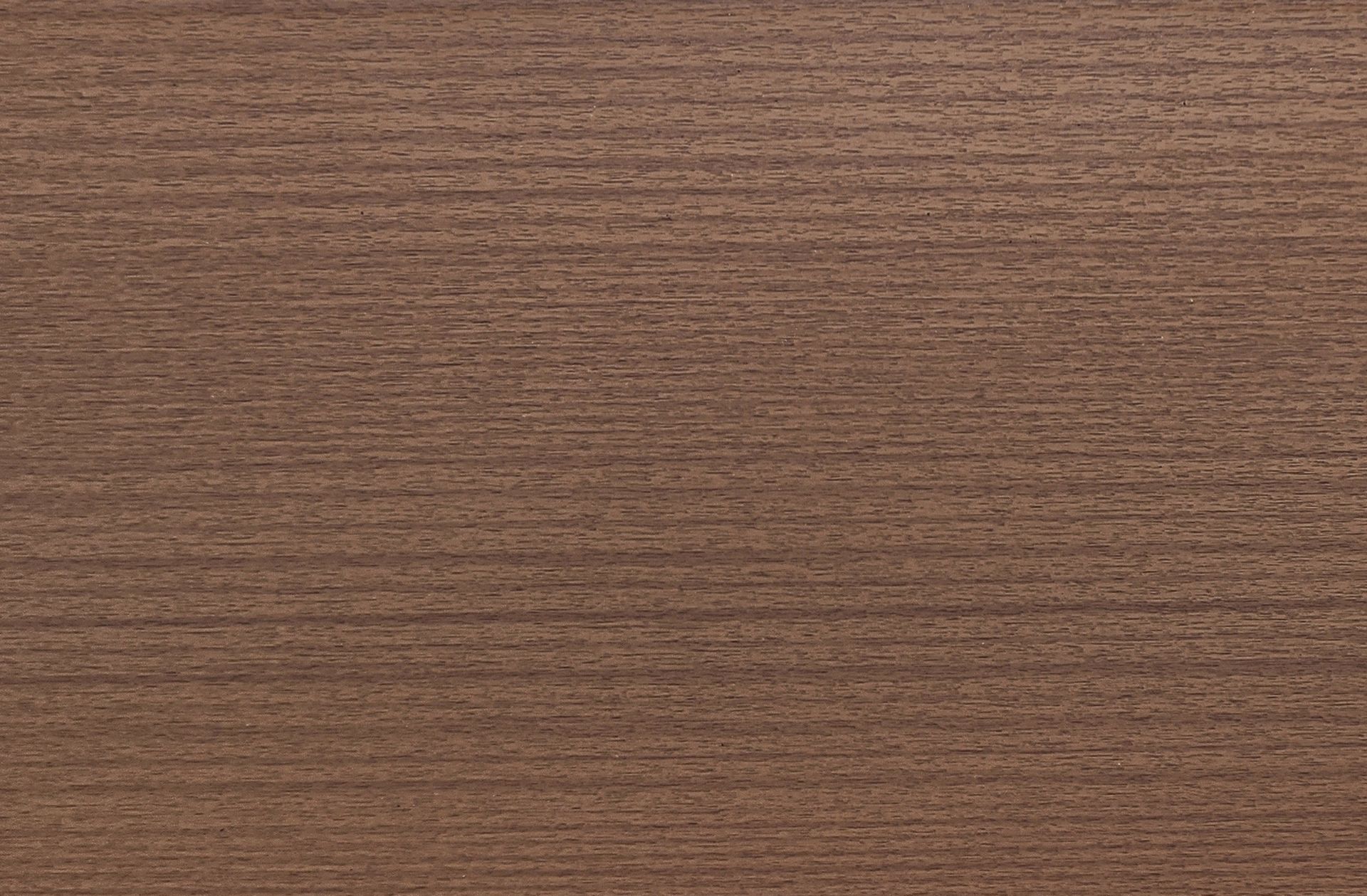 Close-up of wood grain with a reddish-brown color and horizontal lines.