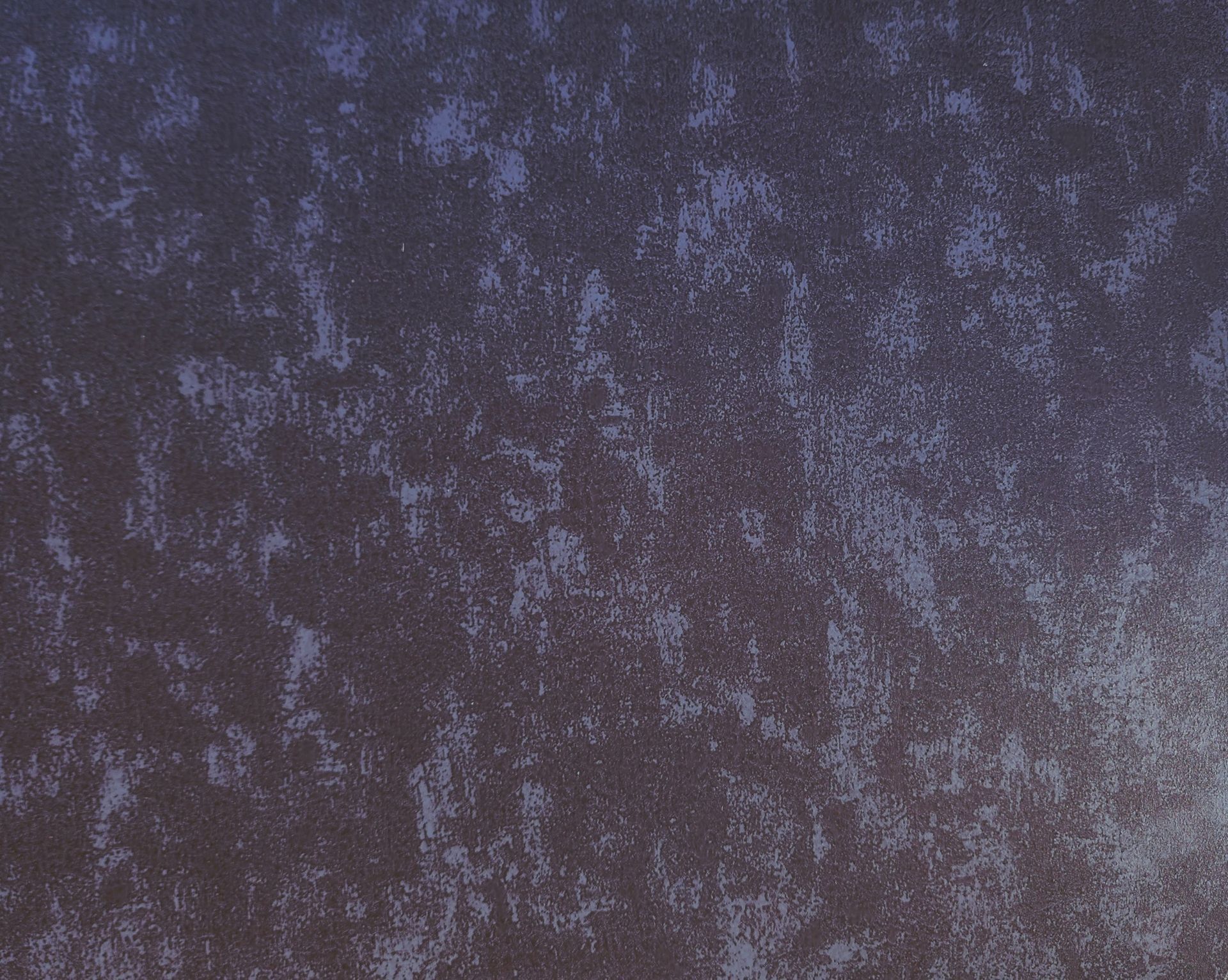 Textured surface with blue and gray mottled effect.