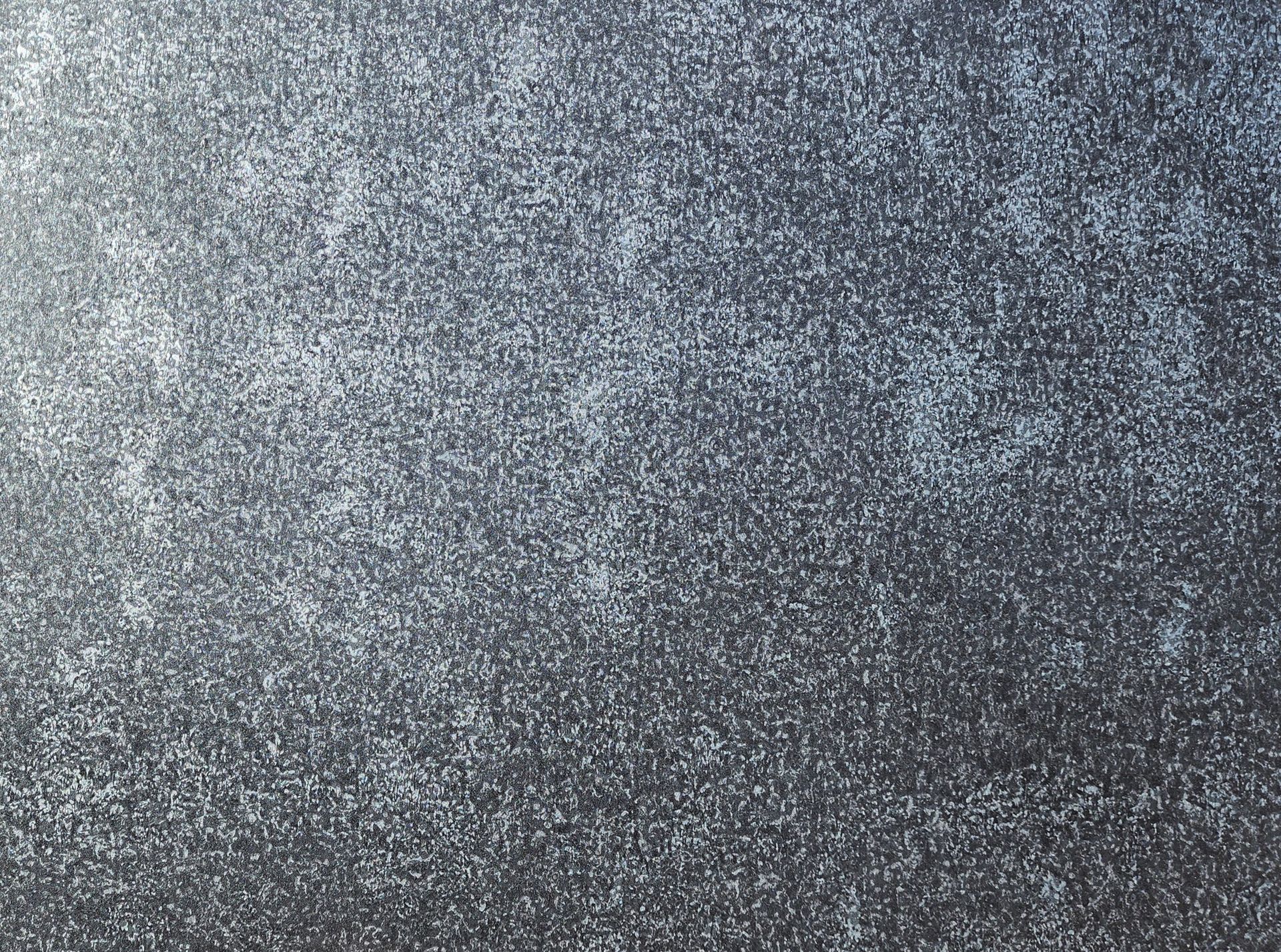 Dark gray textured background with subtle highlights.