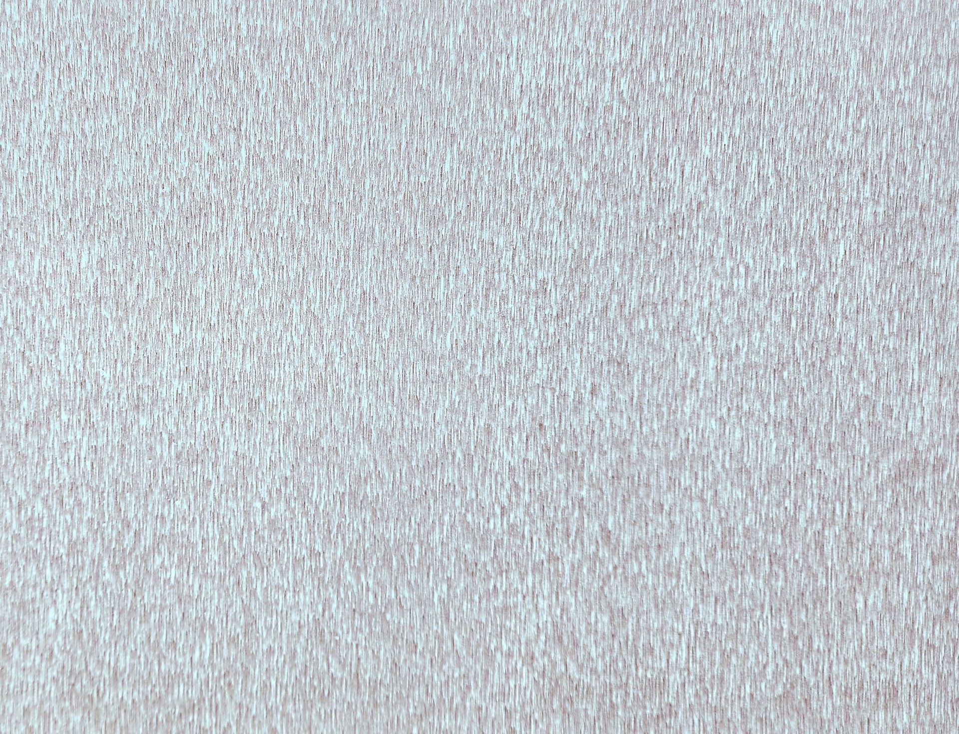 Textured pale gray surface.