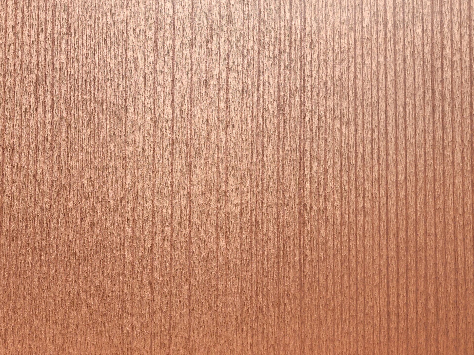 Vertical grain light brown wood.