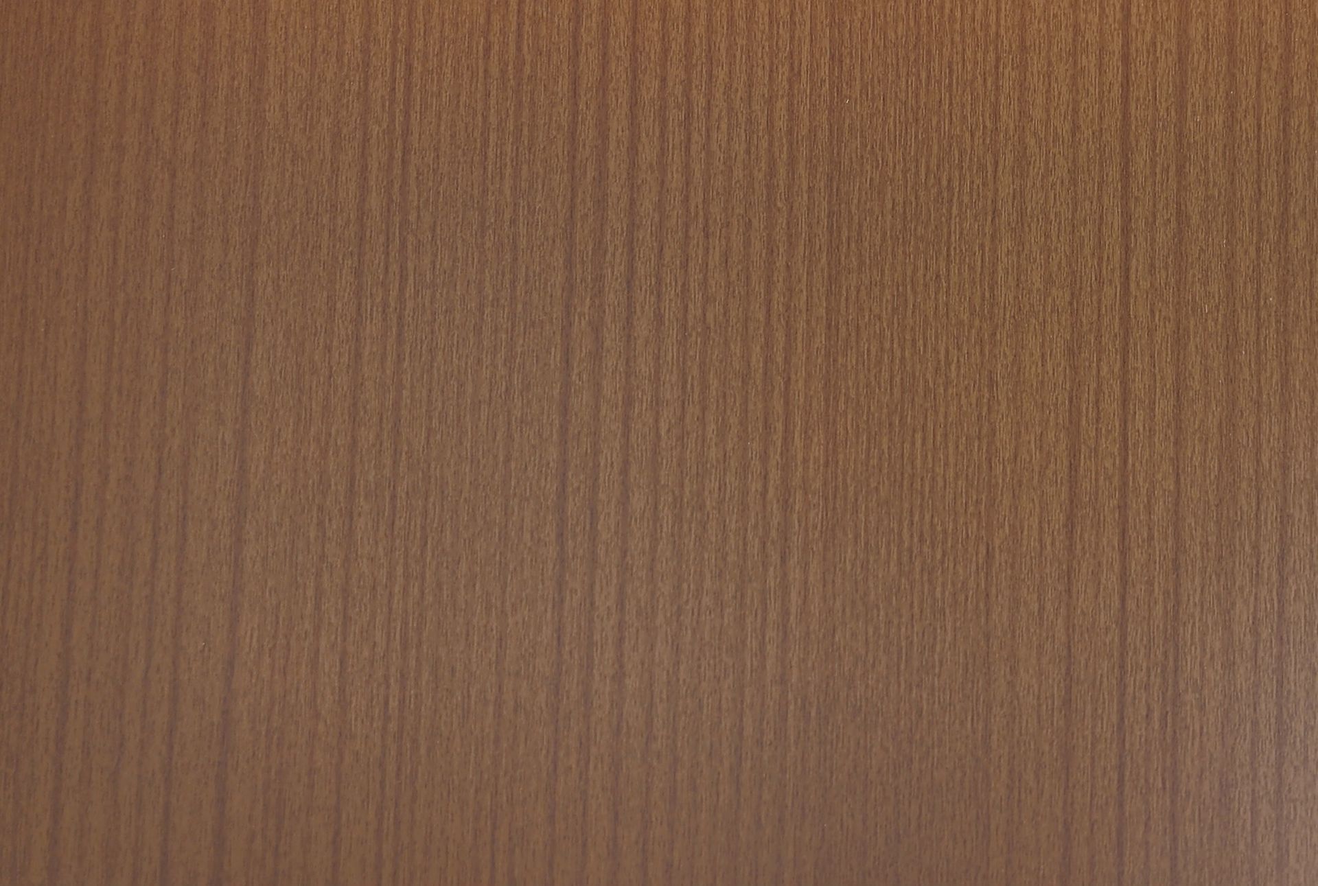 Close-up of a brown wooden surface with vertical grain lines.