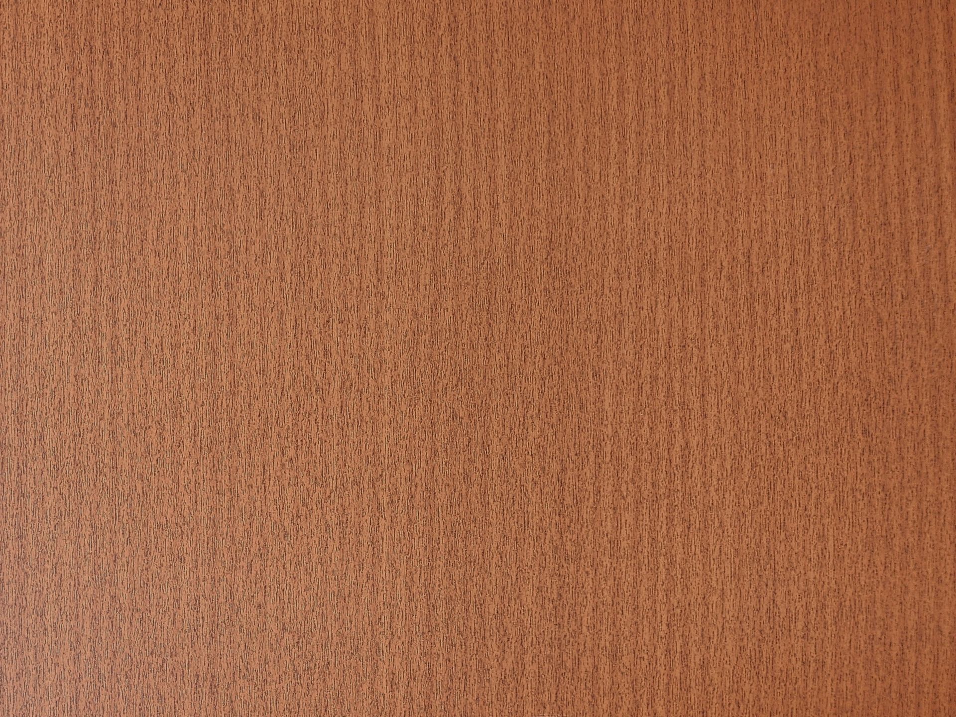 Textured orange wall surface.