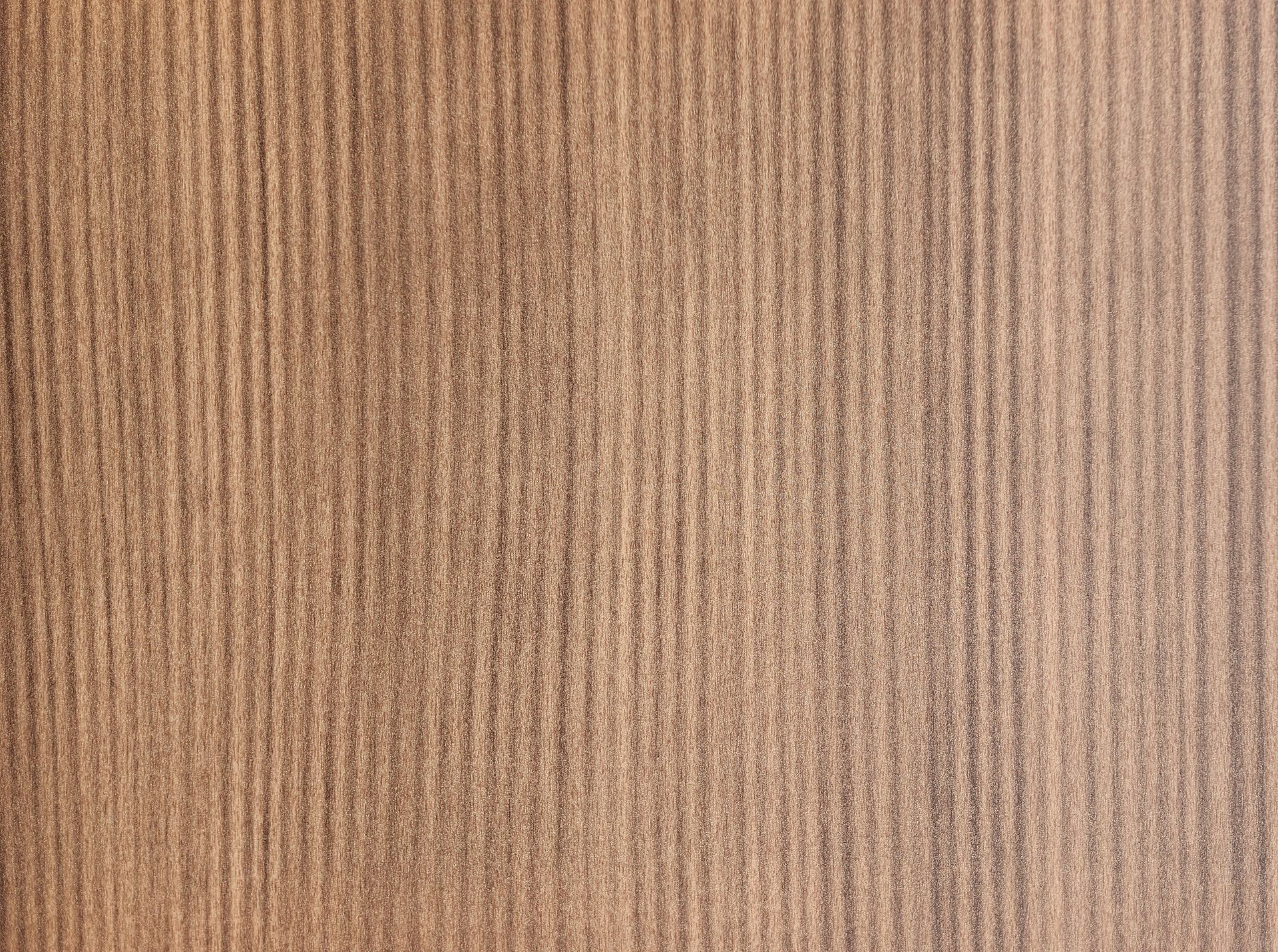 Tan, vertically striped carpet.