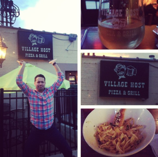 Man holding a Village Host Pizza & Grill sign collage with beer and pasta dishes