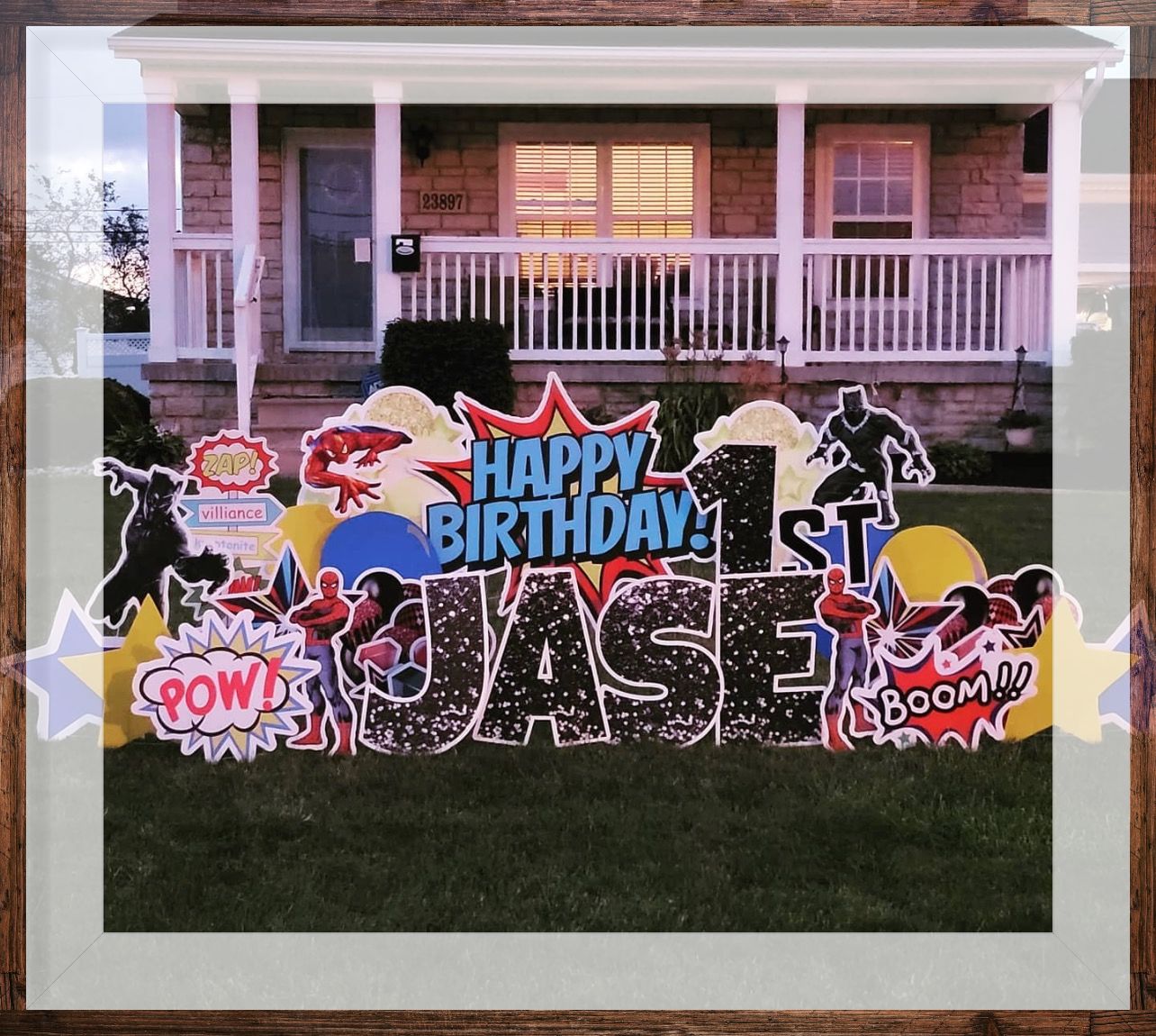 A framed picture of a happy birthday sign for jase