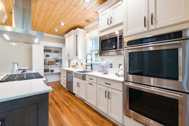 Cozy white wooden kitchen at home