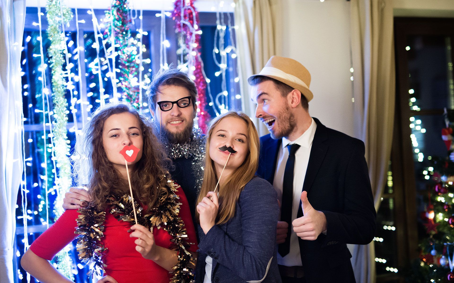 A group of people are posing for a picture at a party.