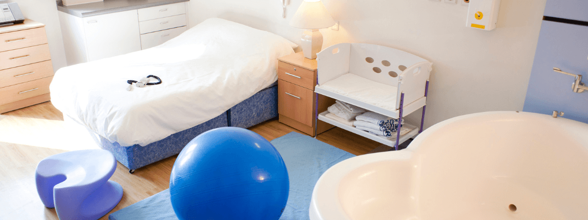 Birth centre room in South West London with birthing pool and exercise ball