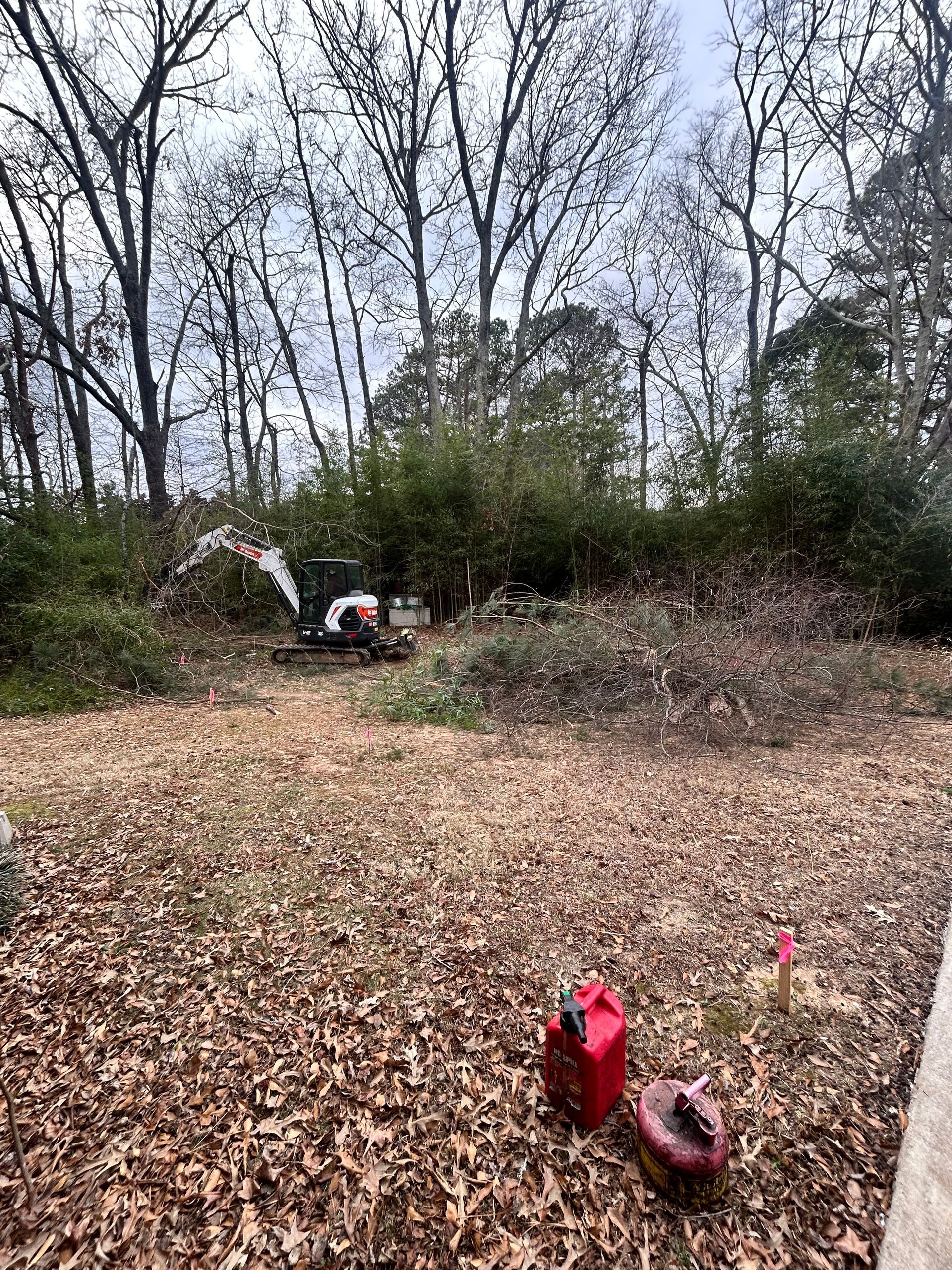 Site clearing underway on a Mims Custom Home Construction project in North Alabama.](