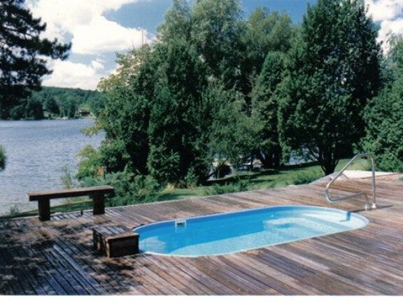 Swimming pool with wooden deck