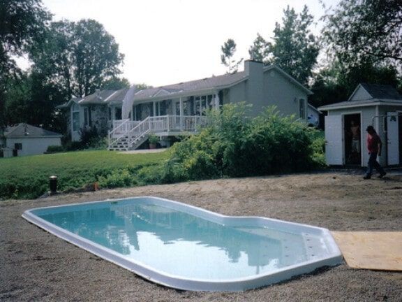 Backyard with an in-ground swimming pool