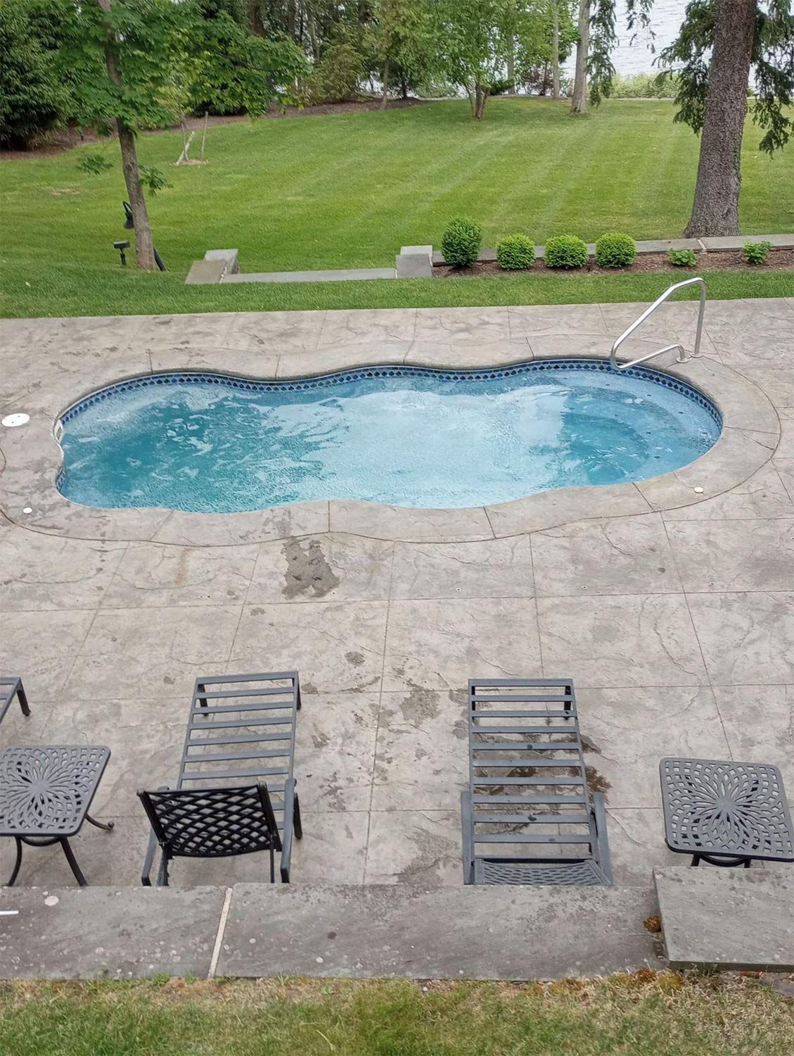 Backyard with small pool in backyard