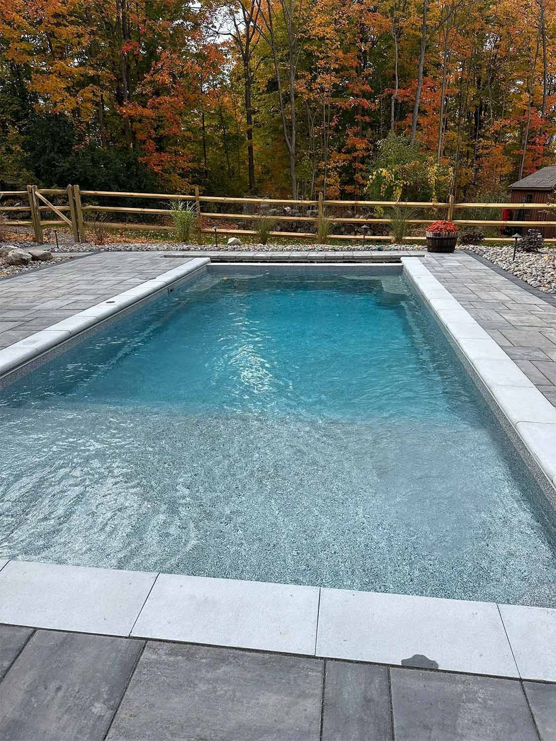 Rectangular outdoor pool with clear water