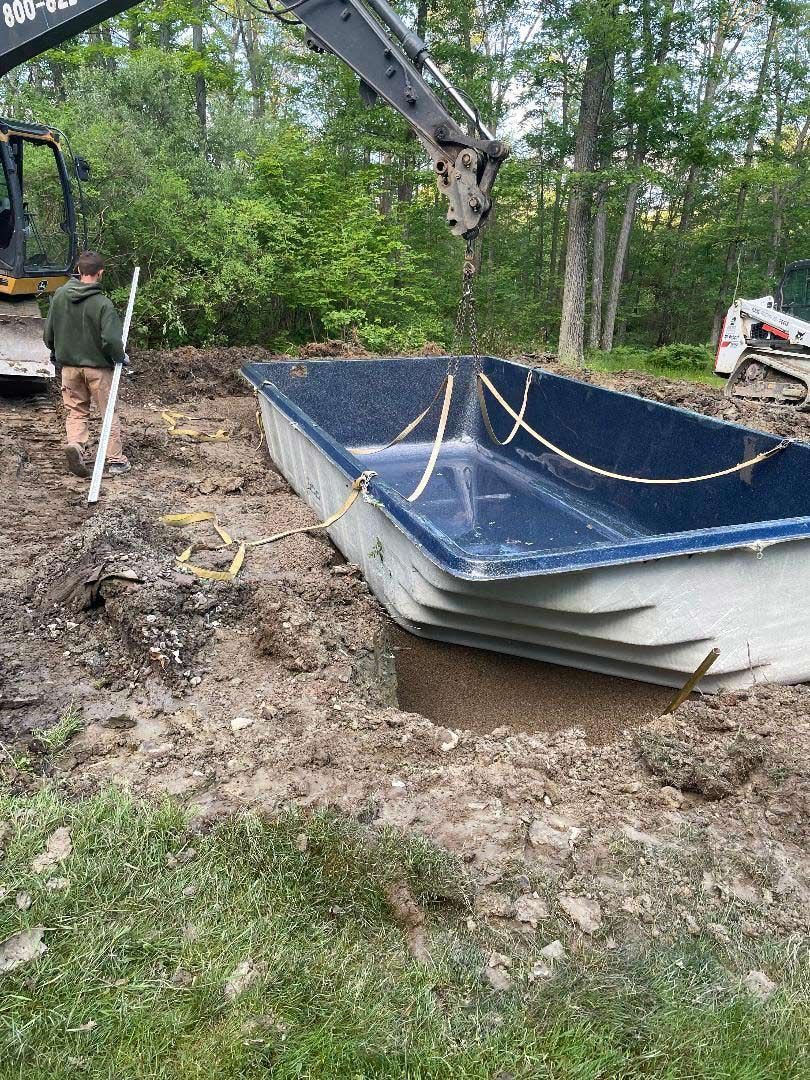 Pool installation in a muddy yard