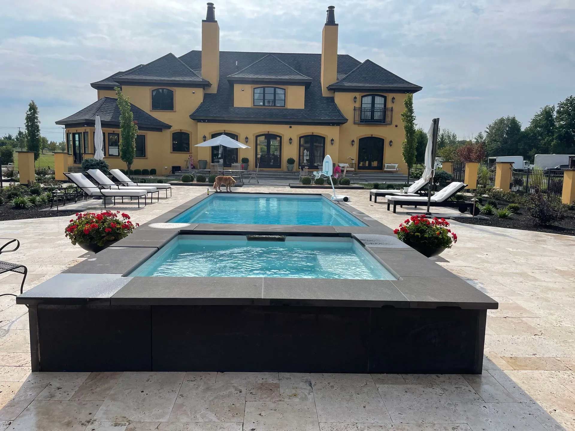 Home with pool and landscaped patio