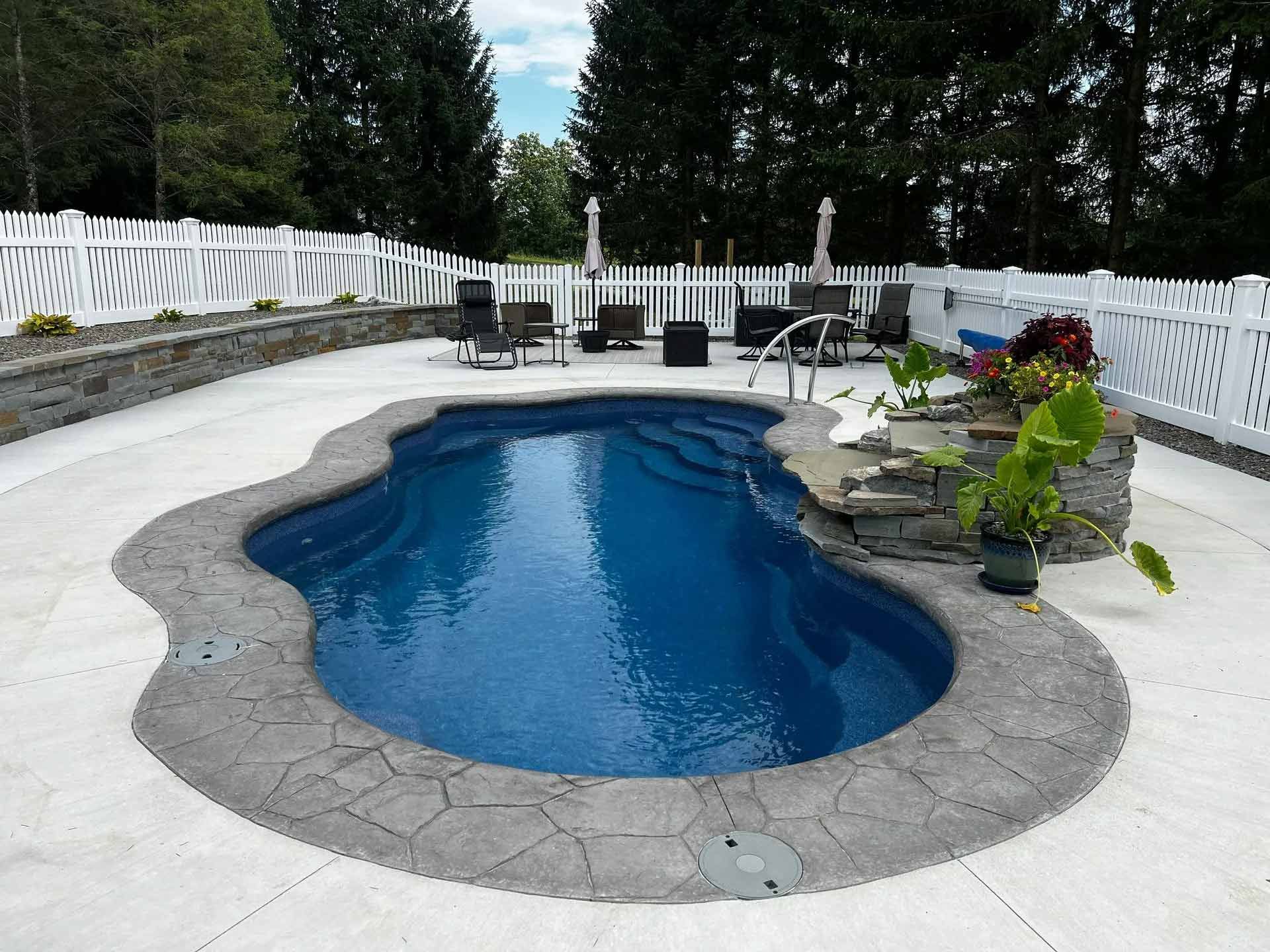Backyard pool with blue water