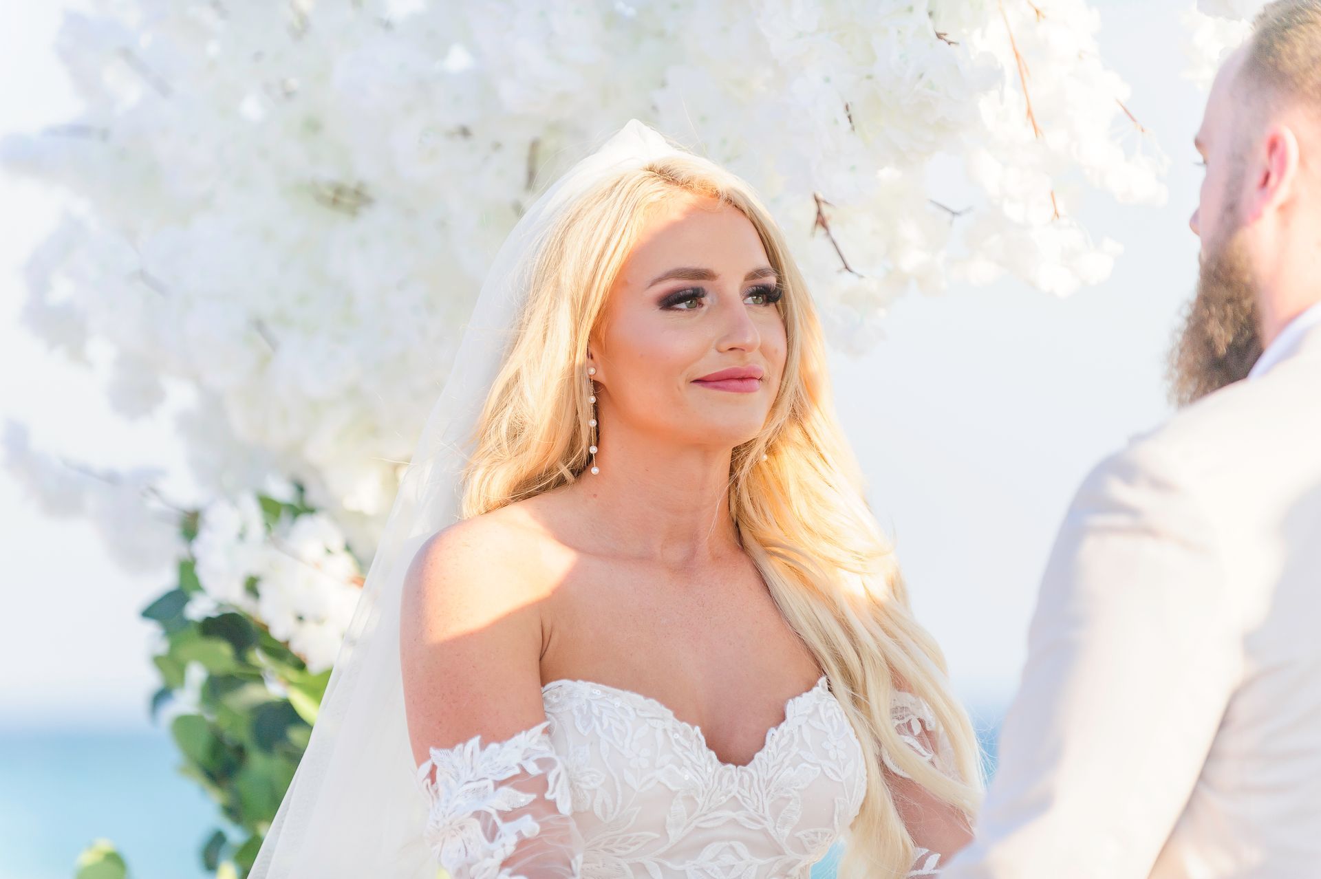 bride looking at groom during wedding ceremony
