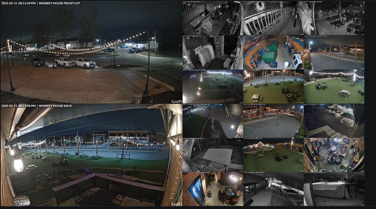 A security camera display with multiple views of a parking lot and various outdoor and indoor areas, all at night.