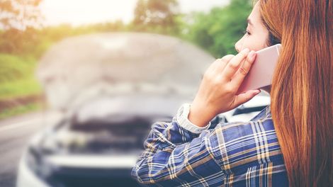 Woman With Car Calling For Help