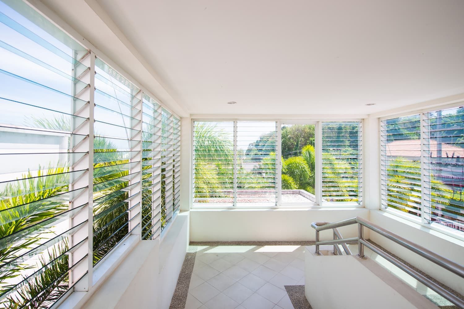 An Empty Room with Lots of Windows and Shutters — A Brush With Colour in Kawungan, QLD