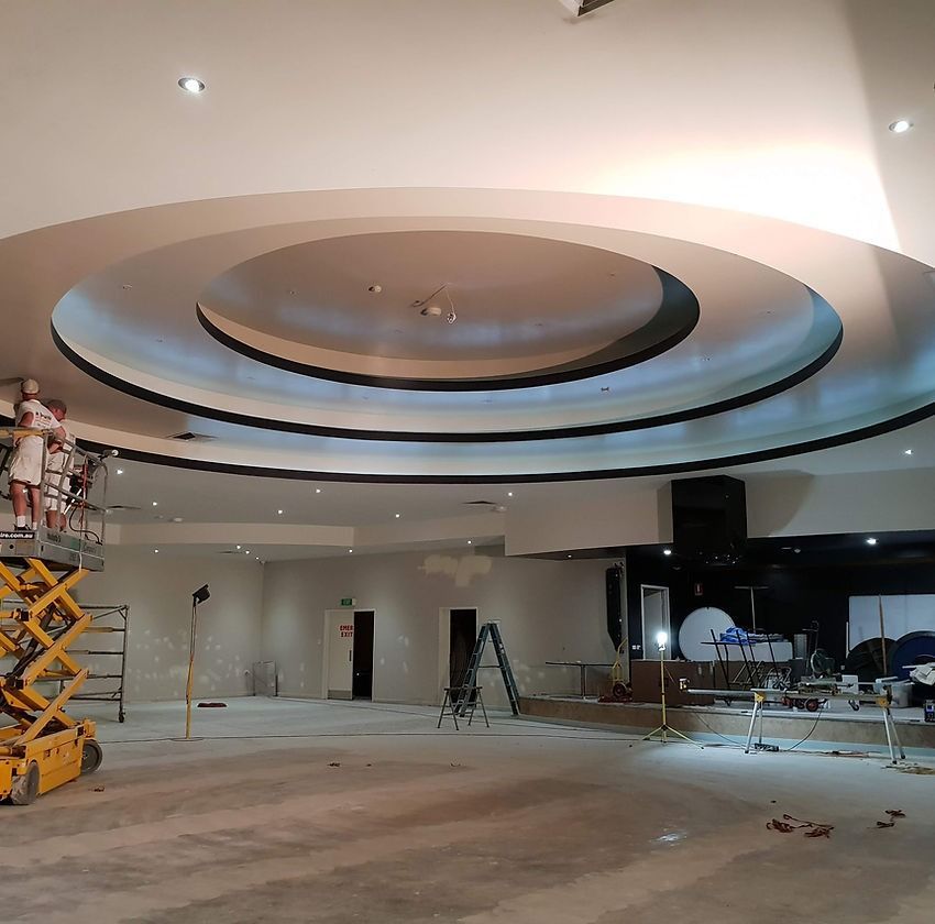 A Large Room with A Circular Ceiling Is Being Remodeled — A Brush With Colour in Craignish, QLD