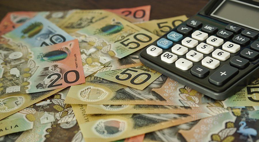 A Calculator With Australian Money 50 Dollars And 20 Dollars