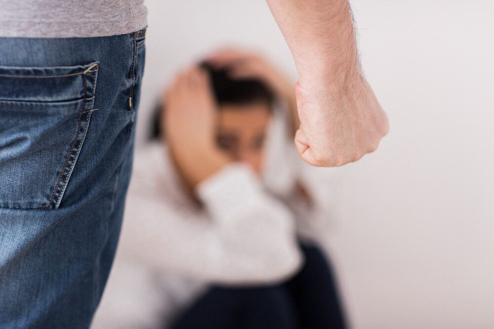 Man's Fist Raised Towards a Woman — Hannaway Lawyers in Port Macquarie, NSW