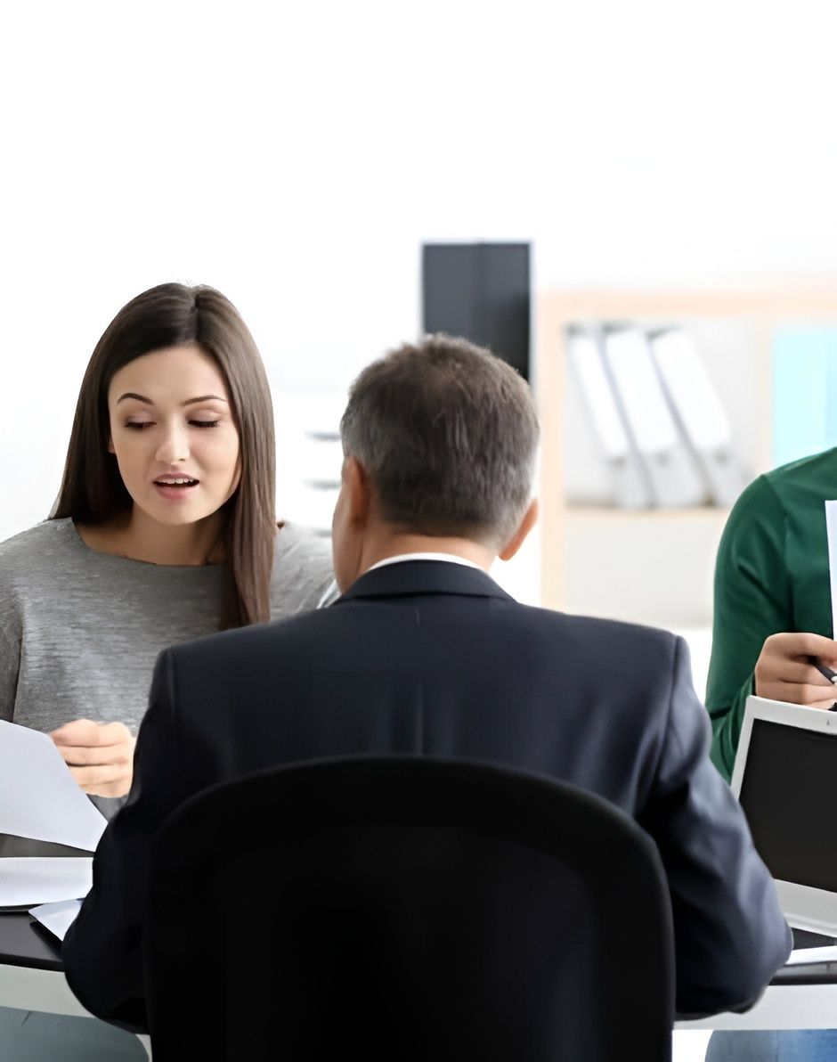 Woman and Two Men in a Business Meeting — Hannaway Lawyers in Kempsey, NSW