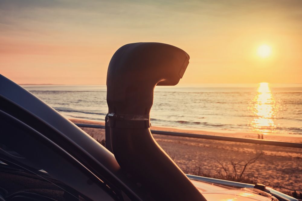 A Black Car Snorkel by the Beach at Sunset — Morty's Mechanical In Garbutt, QLD