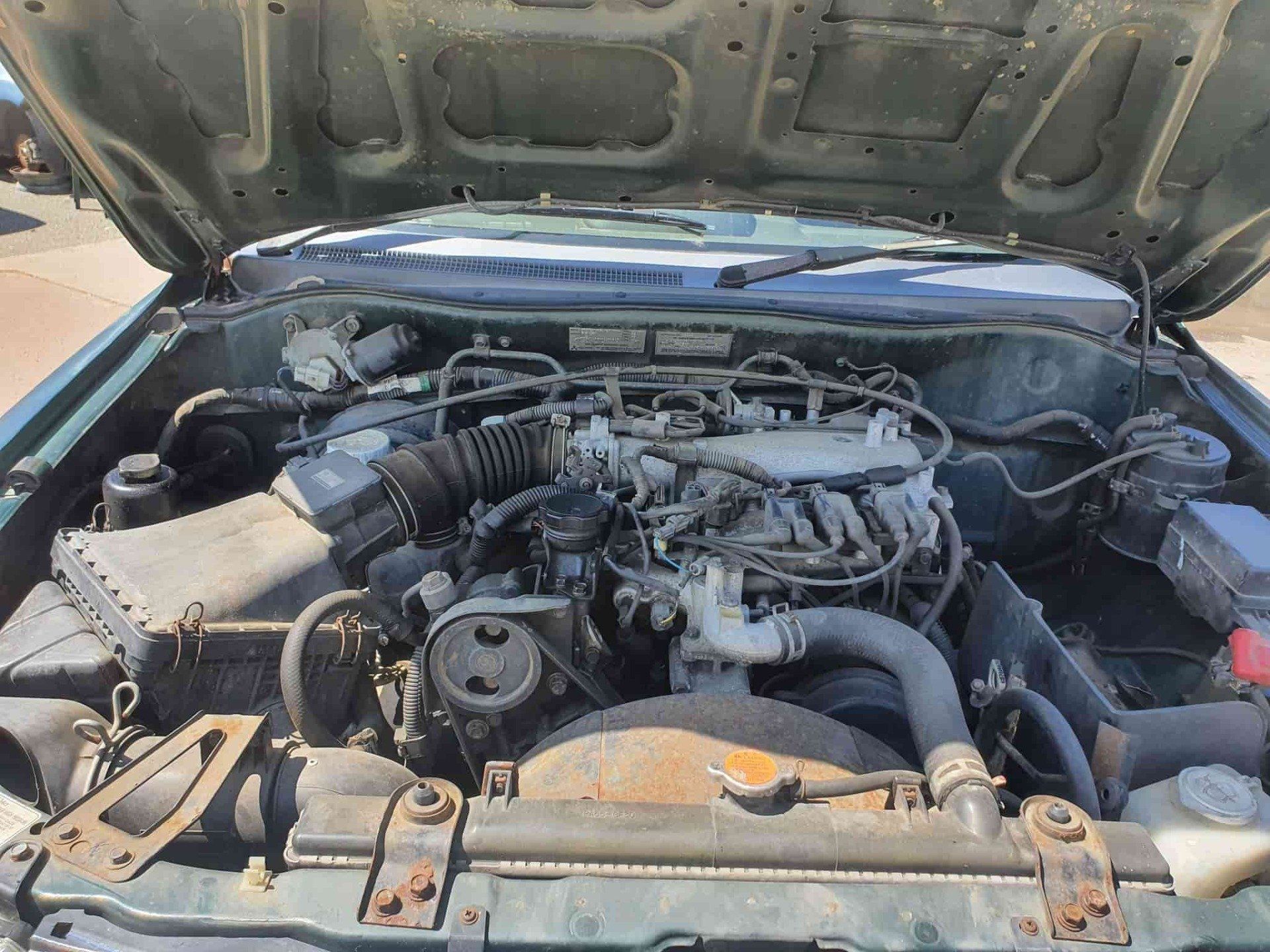 Car Motor for Parts — Local Vehicle Scrapping And Repair Professionals in Bondoola, QLD