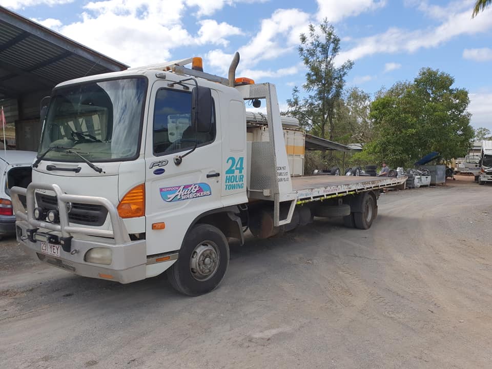 Yeppoon Auto Wreckers Tow Truck — Local Vehicle Scrapping And Repair Professionals in Bondoola, QLD