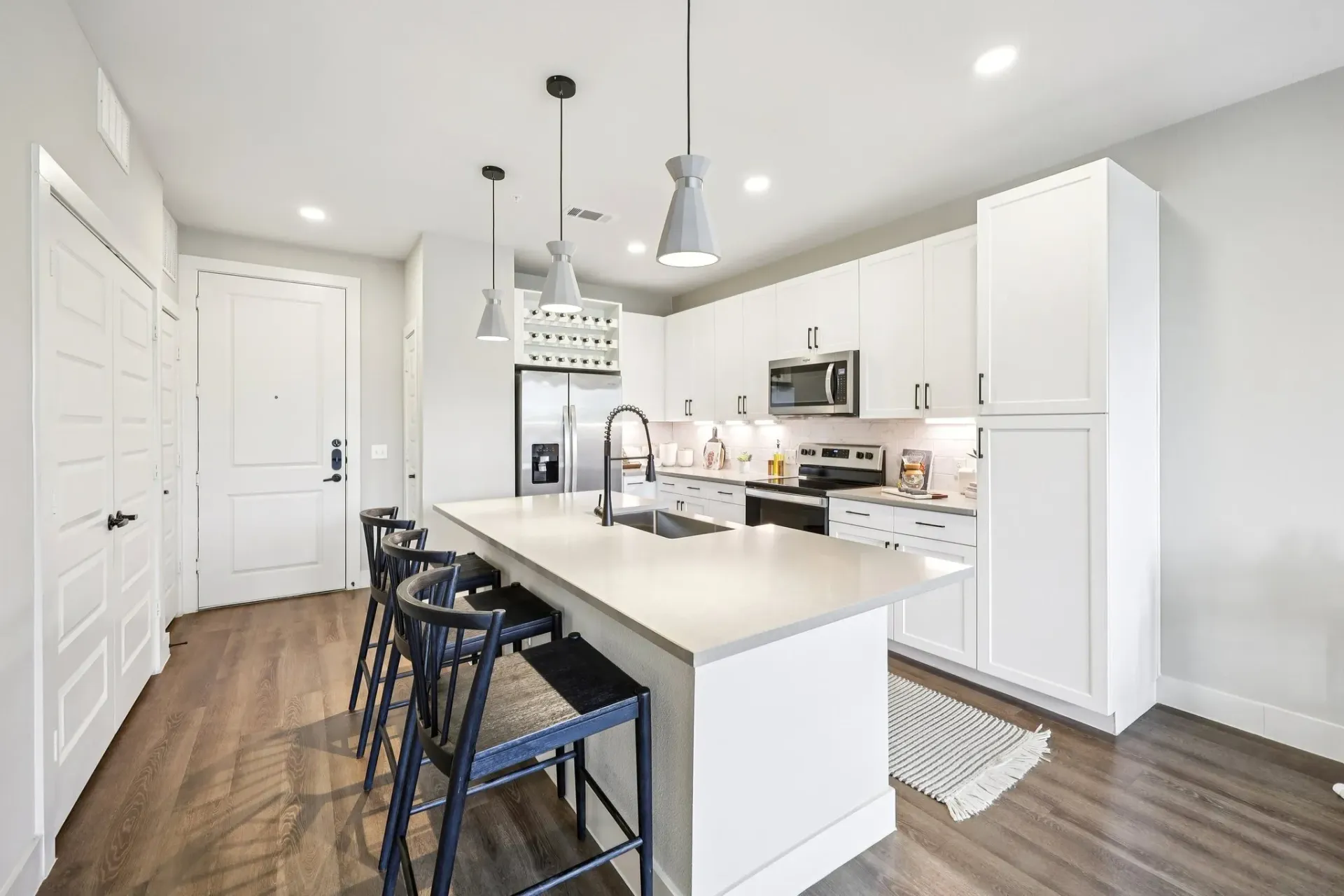 Modern kitchen with island and bar stools