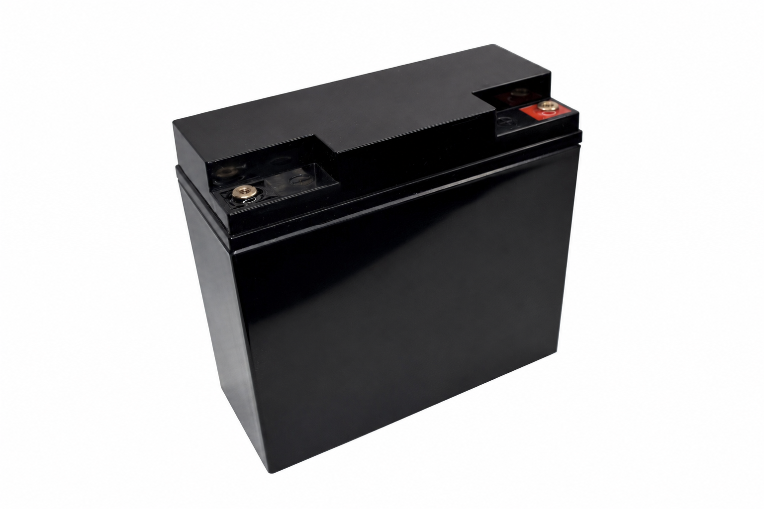 Black car battery with red and black terminals on a white background