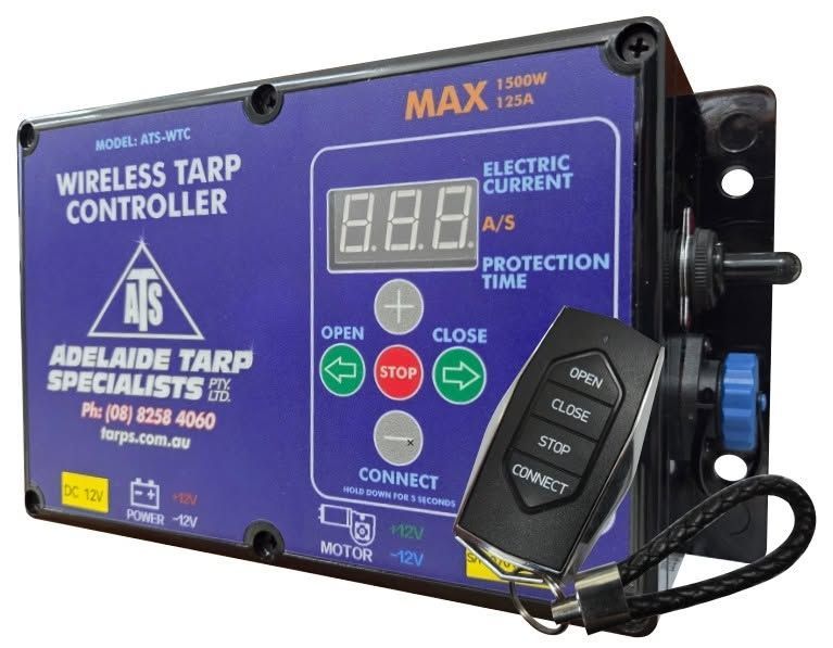 Purple wireless tarp controller with digital display, open/close buttons, and remote control